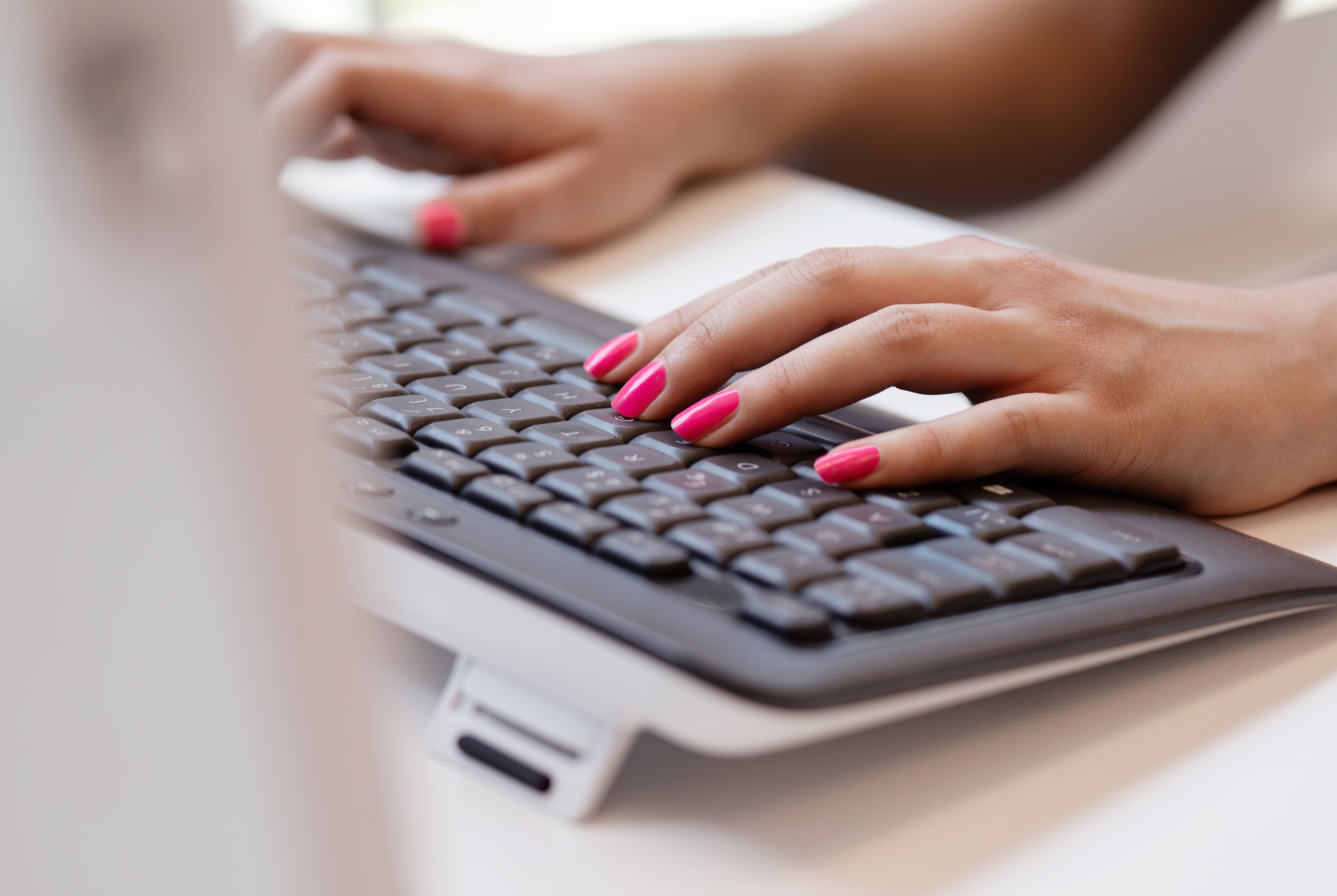 Woman hands typing
